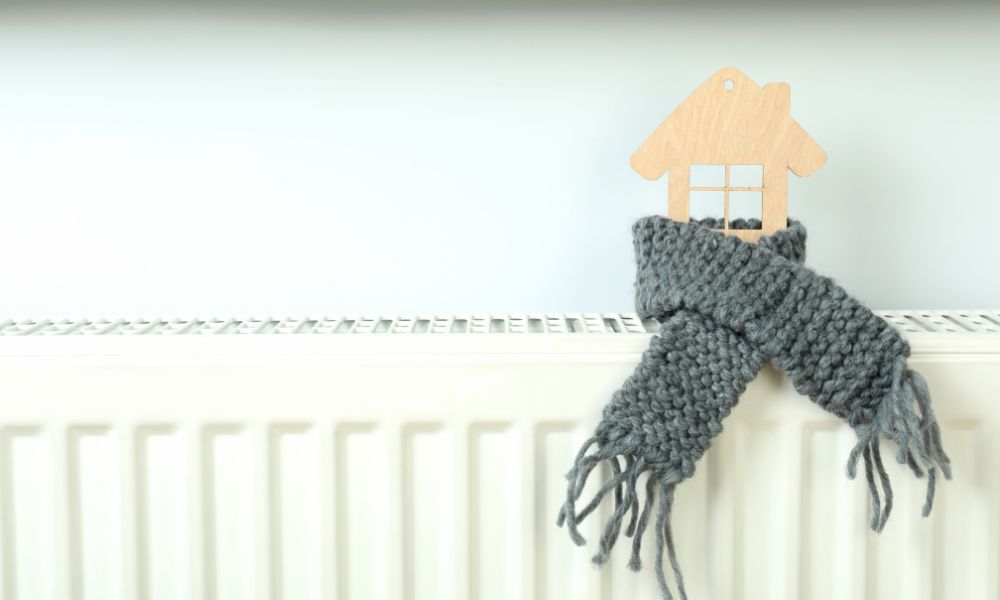 heating season, wooden house on radiator